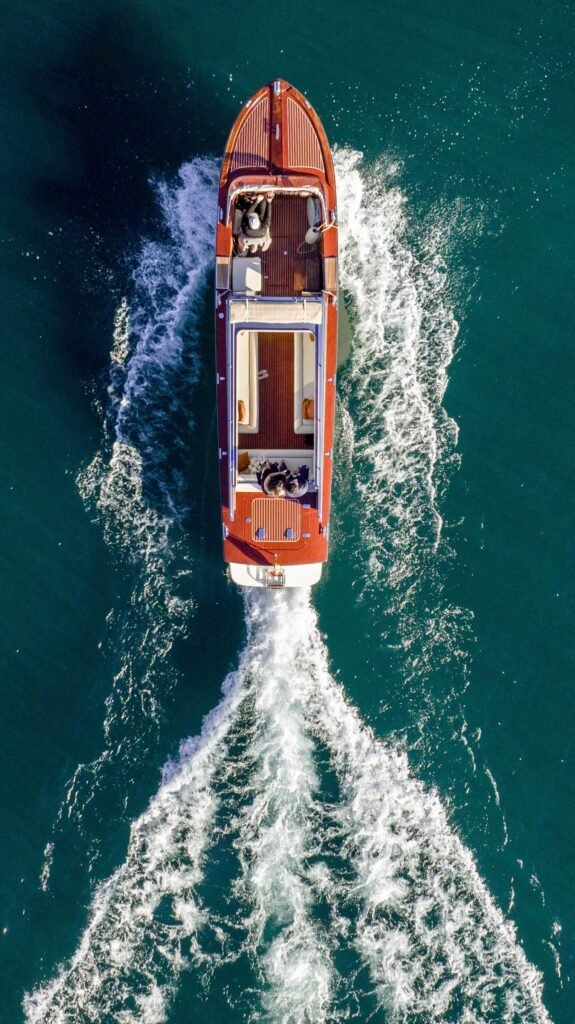 Romantic marriage proposal on a private boat at sunset in Lake Como