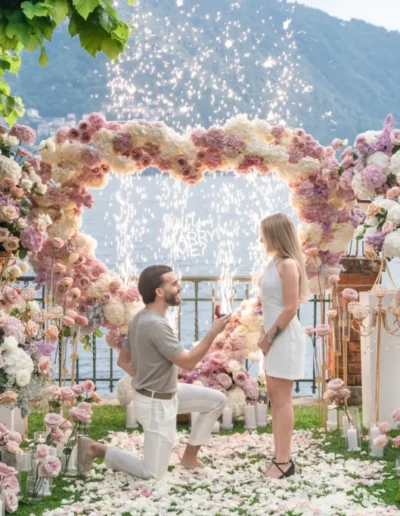 Live violinist performing during a lakeside proposal in Italy