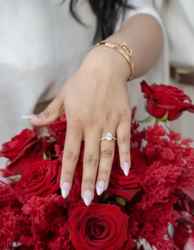 Engagement ring in a velvet box with Lake Como view in the background