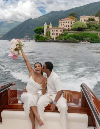 Man proposing at sunset on a private boat in Lake Como
