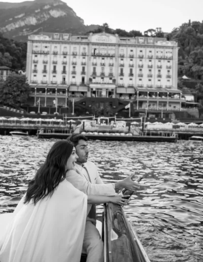 Champagne toast on a taxi boat post-proposal in Lake Como