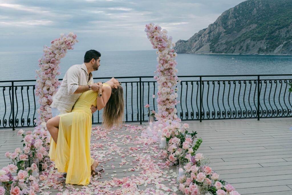 Nicole and Georgio celebrating their engagement overlooking the Ligurian Sea