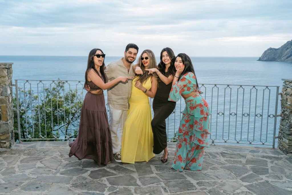Nicole and Georgio celebrating their engagement with friends in the Cinque Terre